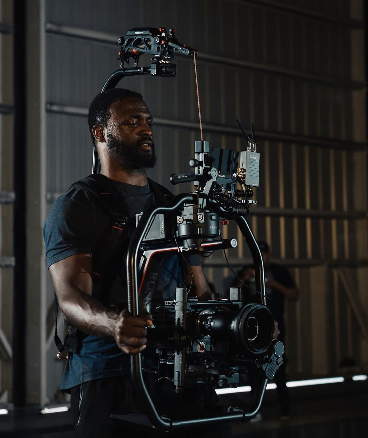 Dee Mount operating the gimbal on set