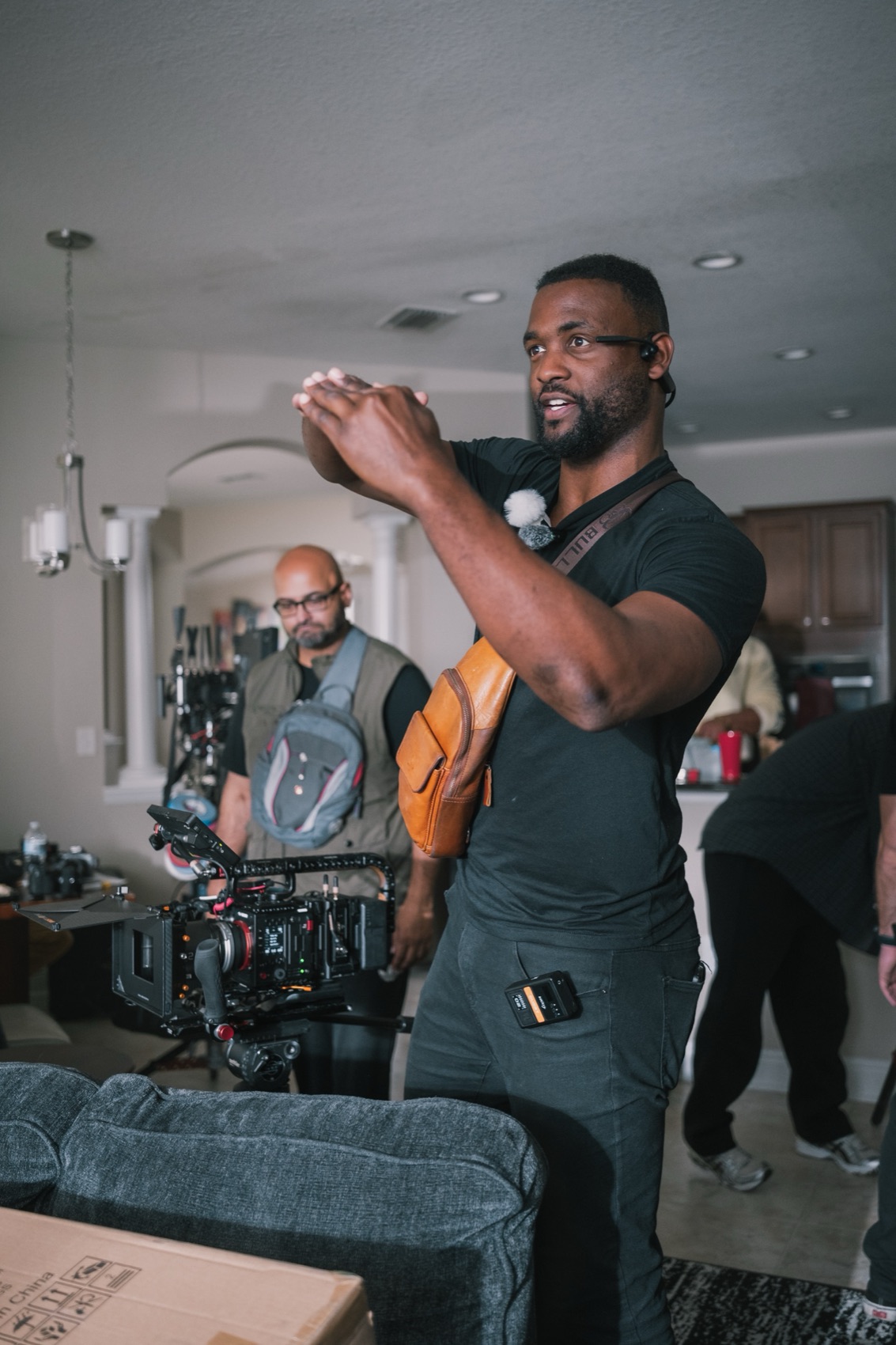 Dee directing on set